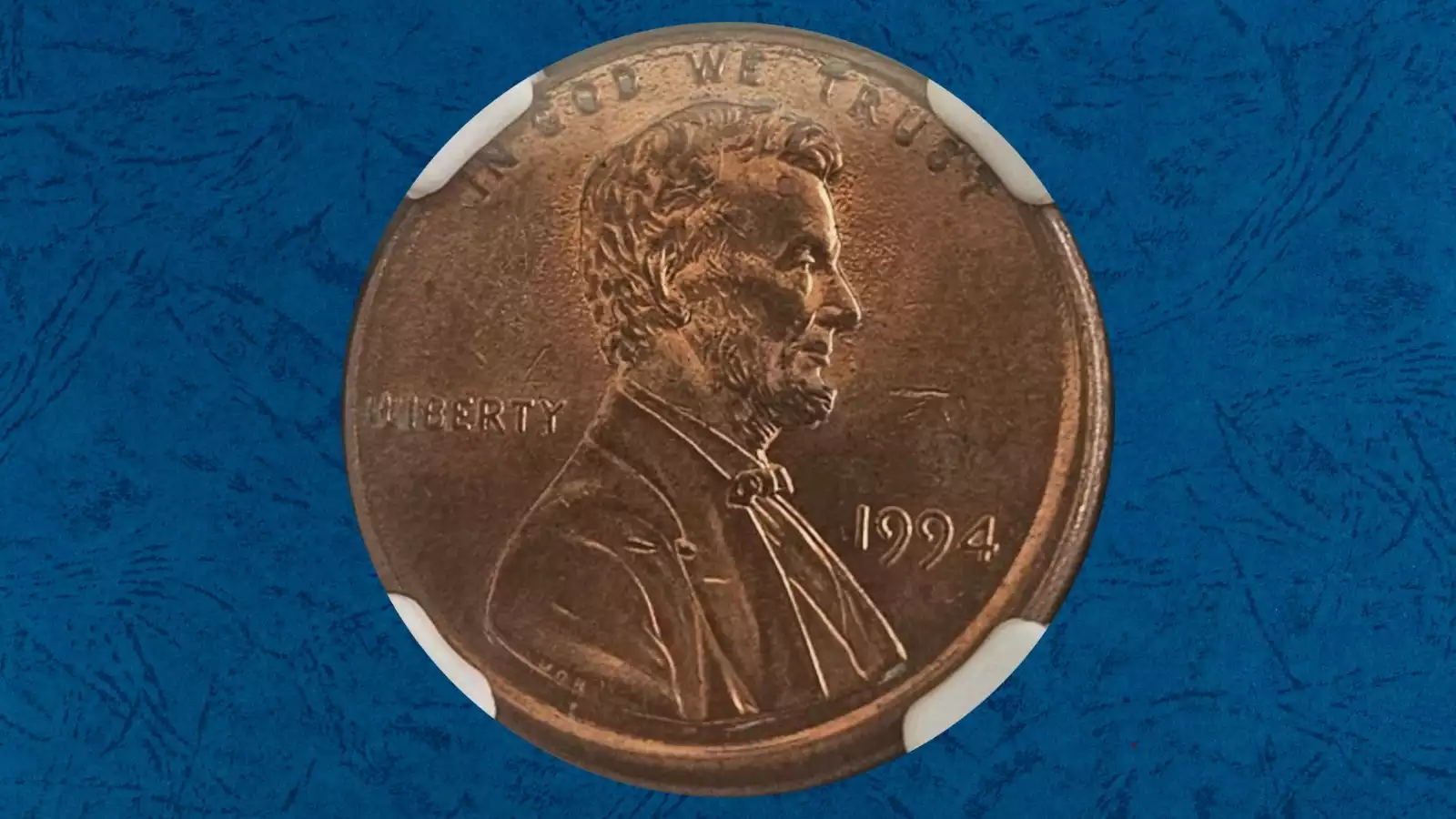 1994 penny off-center strike error with partial design and visible date
