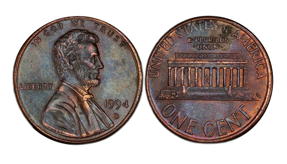 1994 penny grading strip showing four condition levels from worn to gem uncirculated